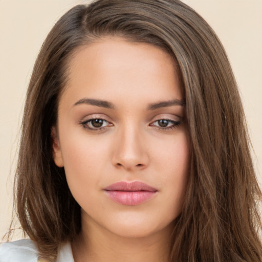 Neutral white young-adult female with long  brown hair and brown eyes