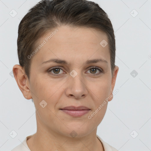 Joyful white adult female with short  brown hair and brown eyes