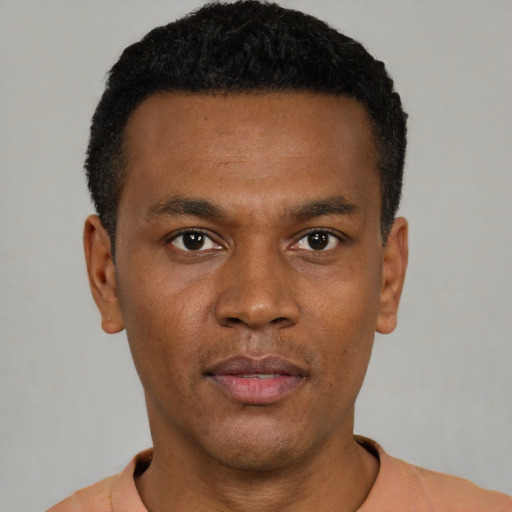 Neutral black young-adult male with short  black hair and brown eyes
