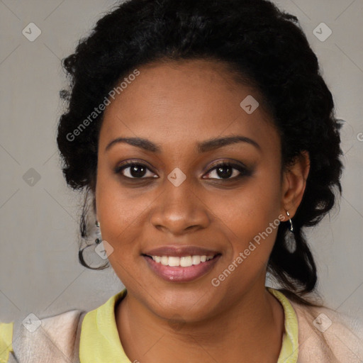 Joyful black young-adult female with medium  black hair and brown eyes