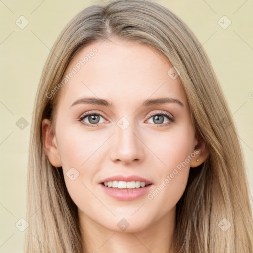 Joyful white young-adult female with long  brown hair and green eyes