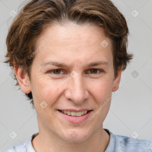 Joyful white adult female with short  brown hair and grey eyes