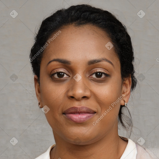 Joyful black young-adult female with medium  black hair and brown eyes