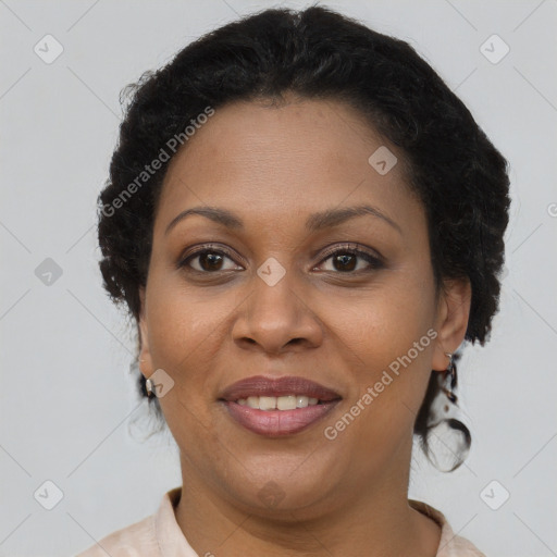 Joyful latino adult female with short  brown hair and brown eyes