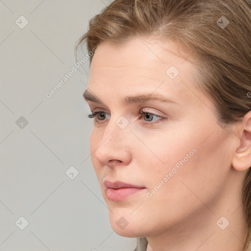 Neutral white young-adult female with medium  brown hair and brown eyes