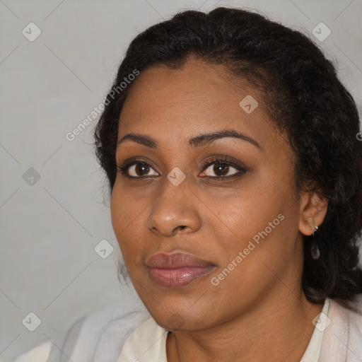 Joyful black young-adult female with medium  black hair and brown eyes