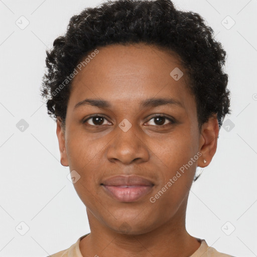 Joyful black young-adult female with short  black hair and brown eyes