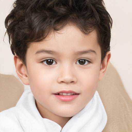 Joyful white child male with short  brown hair and brown eyes