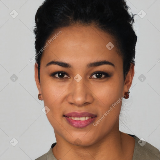 Joyful latino young-adult female with short  black hair and brown eyes