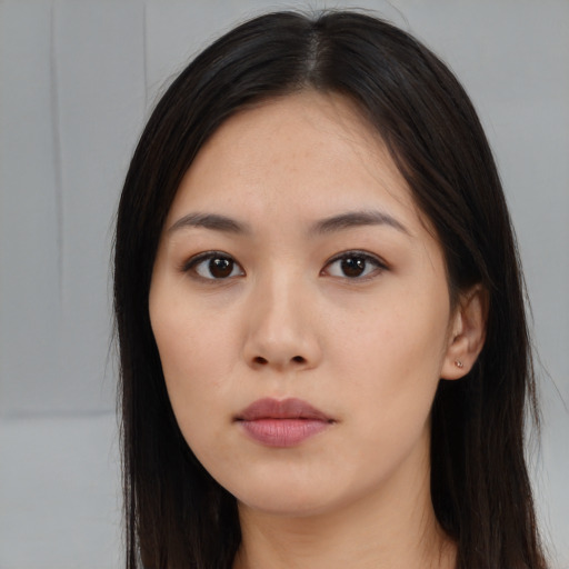 Neutral white young-adult female with long  black hair and brown eyes