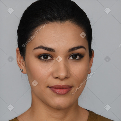 Joyful latino young-adult female with short  brown hair and brown eyes