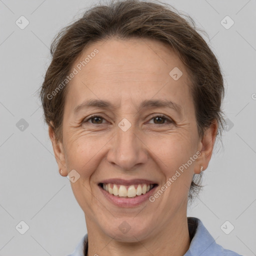 Joyful white adult female with short  brown hair and brown eyes