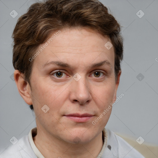 Joyful white adult female with short  brown hair and grey eyes