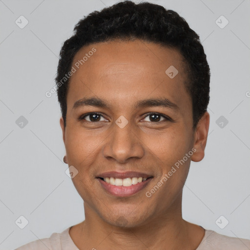 Joyful white young-adult male with short  black hair and brown eyes