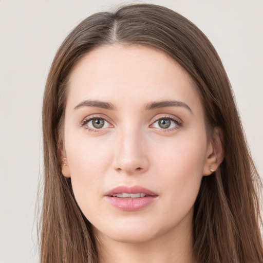 Neutral white young-adult female with long  brown hair and grey eyes