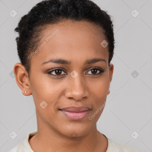 Joyful black young-adult female with short  brown hair and brown eyes