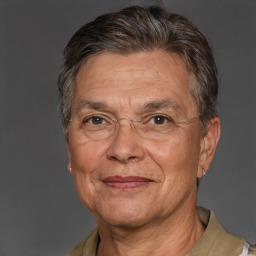 Joyful white middle-aged male with short  brown hair and brown eyes