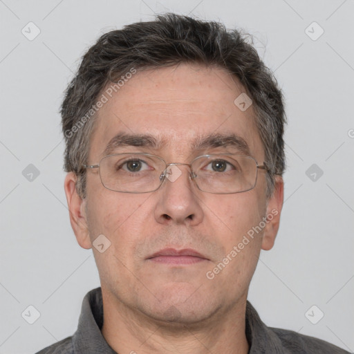 Neutral white middle-aged male with short  brown hair and brown eyes