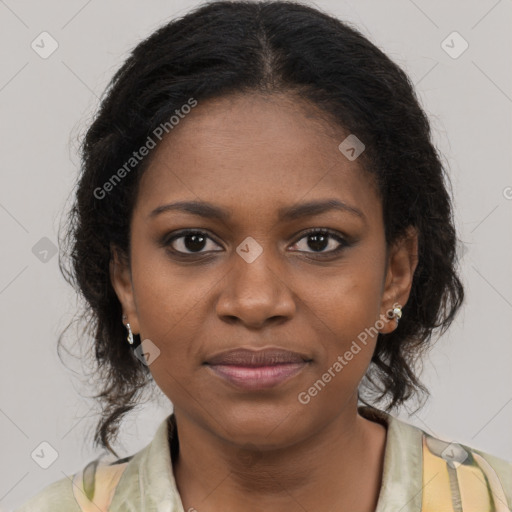 Joyful black young-adult female with medium  brown hair and brown eyes