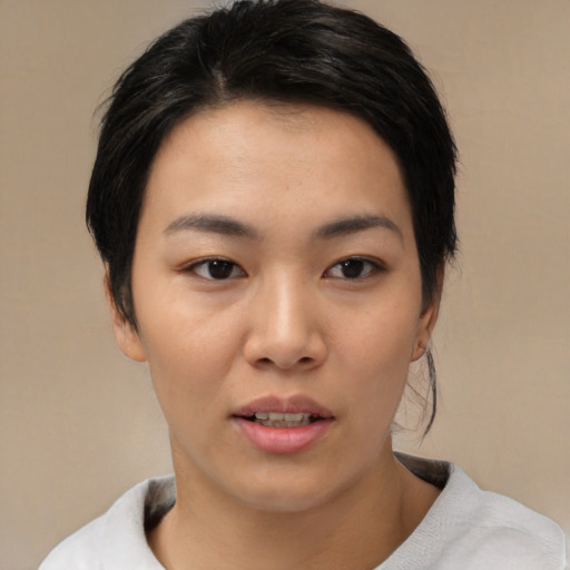 Neutral asian young-adult female with medium  black hair and brown eyes