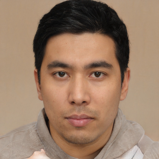 Neutral asian young-adult male with short  black hair and brown eyes