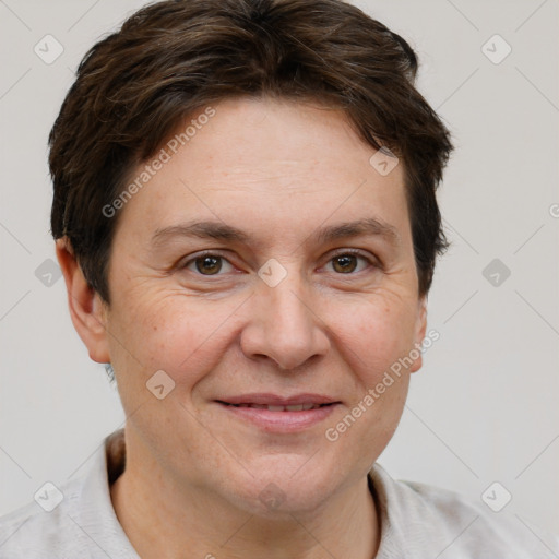 Joyful white adult female with short  brown hair and brown eyes