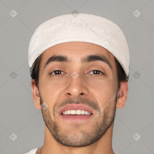 Joyful white young-adult male with short  black hair and brown eyes