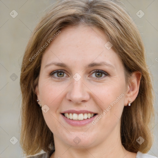 Joyful white young-adult female with medium  brown hair and green eyes