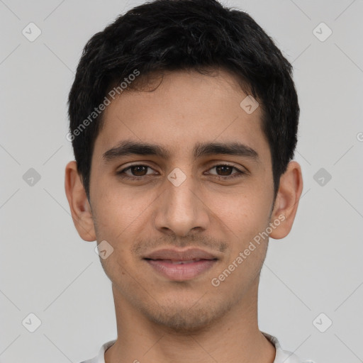 Joyful latino young-adult male with short  black hair and brown eyes