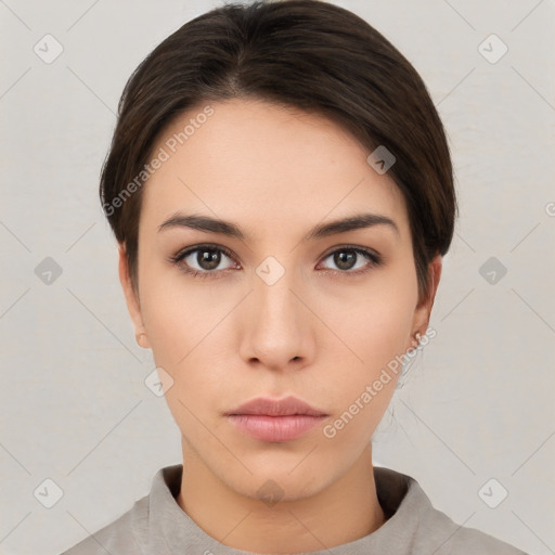 Neutral white young-adult female with short  brown hair and brown eyes