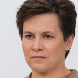 Joyful white adult female with short  brown hair and brown eyes