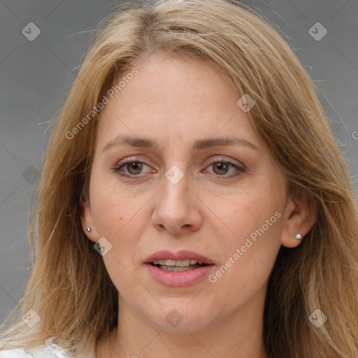 Joyful white adult female with medium  brown hair and brown eyes