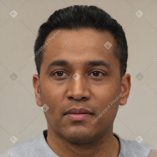 Neutral latino young-adult male with short  black hair and brown eyes