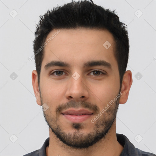 Neutral latino young-adult male with short  black hair and brown eyes