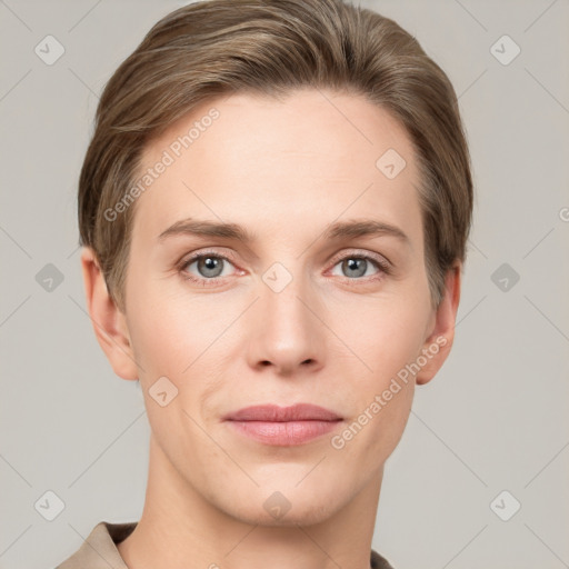 Joyful white young-adult female with short  brown hair and grey eyes