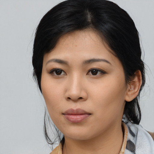 Neutral asian young-adult female with medium  black hair and brown eyes