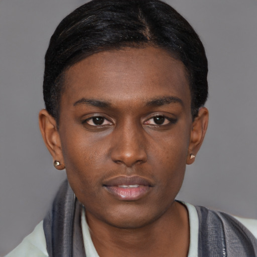 Neutral black young-adult male with short  black hair and brown eyes
