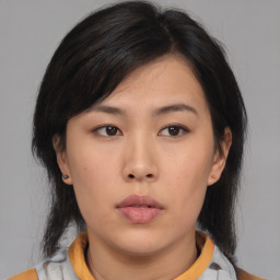 Neutral asian young-adult female with medium  black hair and brown eyes