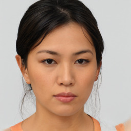 Neutral asian young-adult female with medium  brown hair and brown eyes