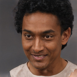 Joyful latino young-adult male with short  brown hair and brown eyes