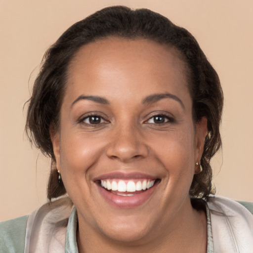 Joyful white young-adult female with medium  brown hair and brown eyes