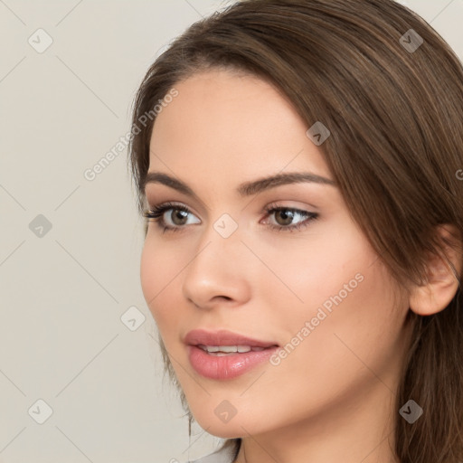 Neutral white young-adult female with long  brown hair and brown eyes