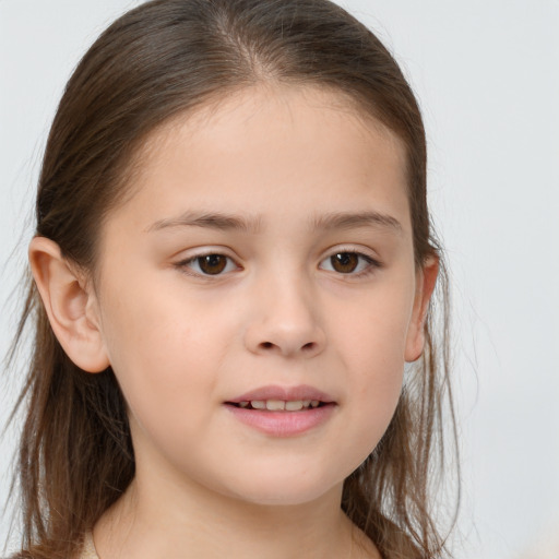 Joyful white child female with long  brown hair and brown eyes