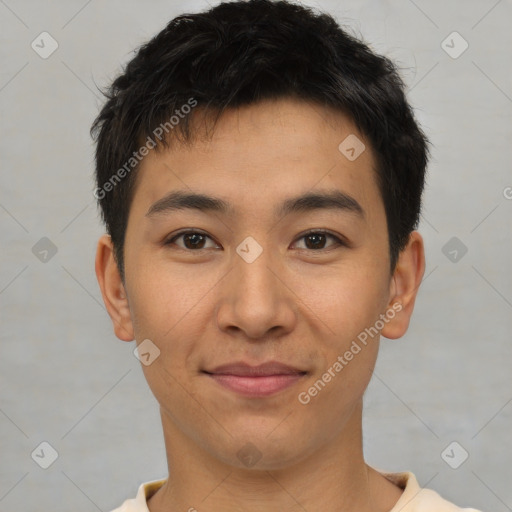 Joyful asian young-adult male with short  brown hair and brown eyes