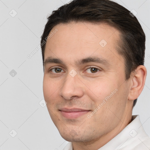 Joyful white adult male with short  brown hair and brown eyes