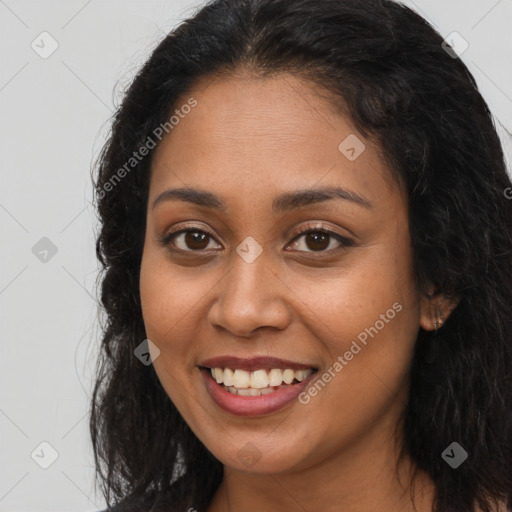 Joyful latino young-adult female with long  brown hair and brown eyes