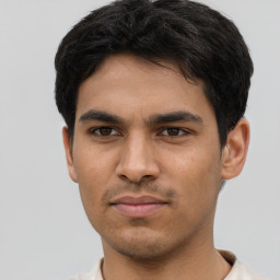 Neutral asian young-adult male with short  brown hair and brown eyes