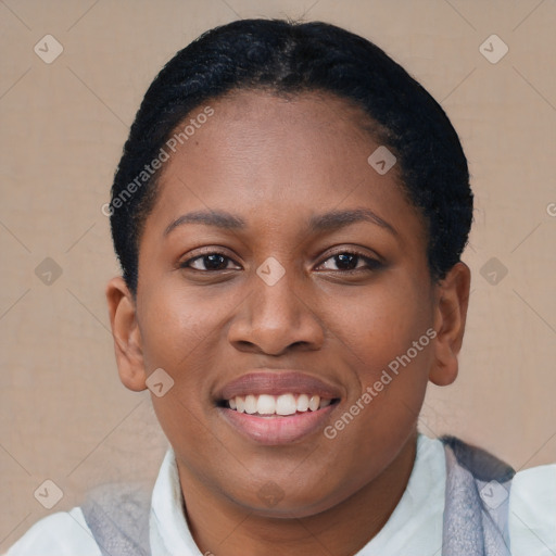 Joyful latino young-adult female with short  black hair and brown eyes