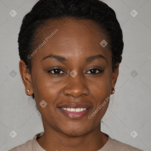 Joyful black young-adult female with short  black hair and brown eyes