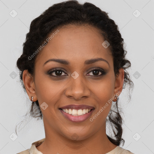 Joyful black young-adult female with medium  brown hair and brown eyes